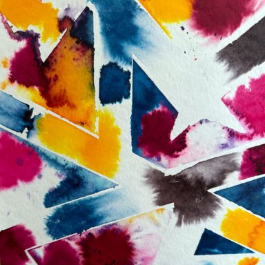 Gelbe, rote, blaue und schwarze Aquarellfarben